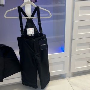 Kids ski pants. Never worn, tags still attached. Size 4, all all black.